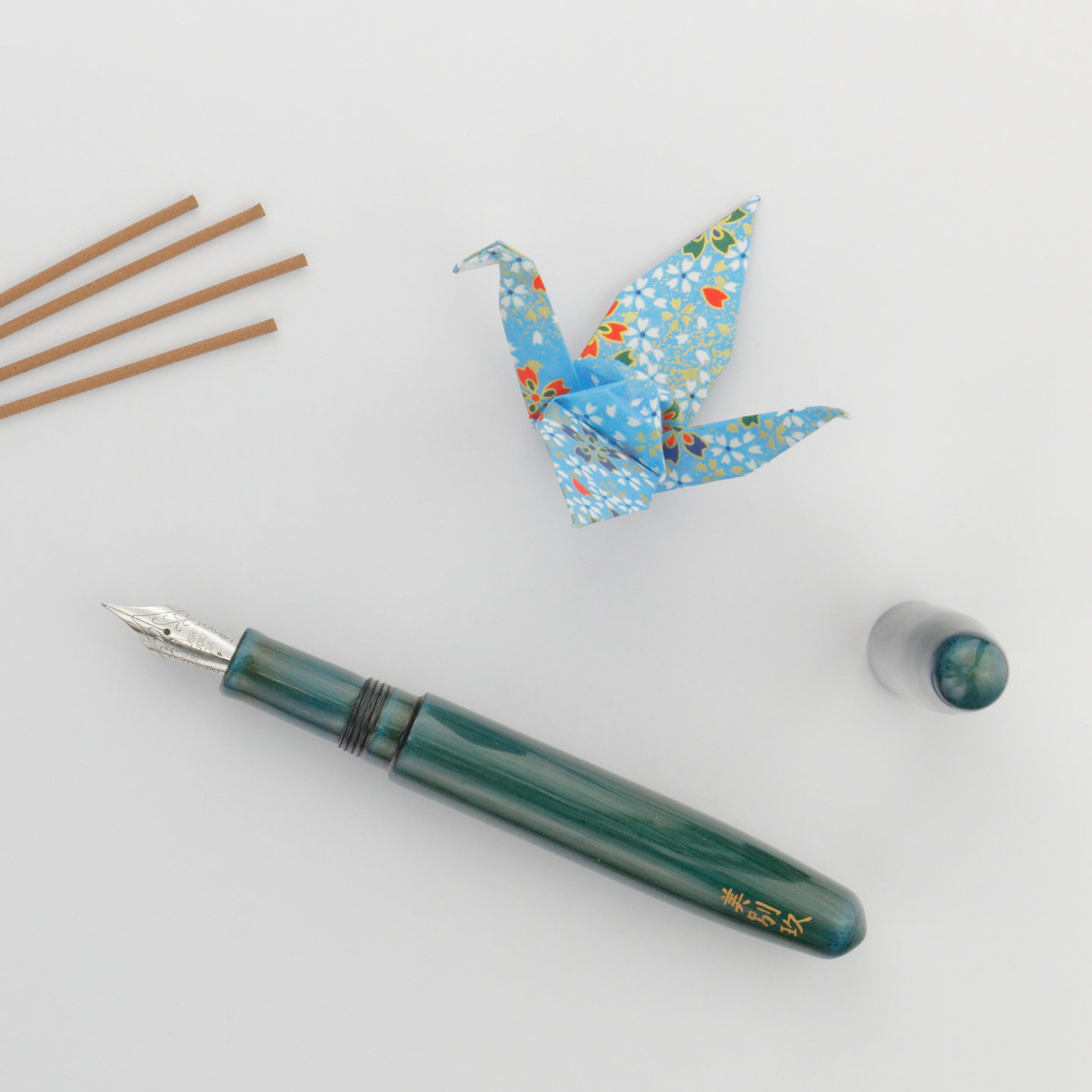 Urushi Studio India Shamshir Metallic Blue with origami crane