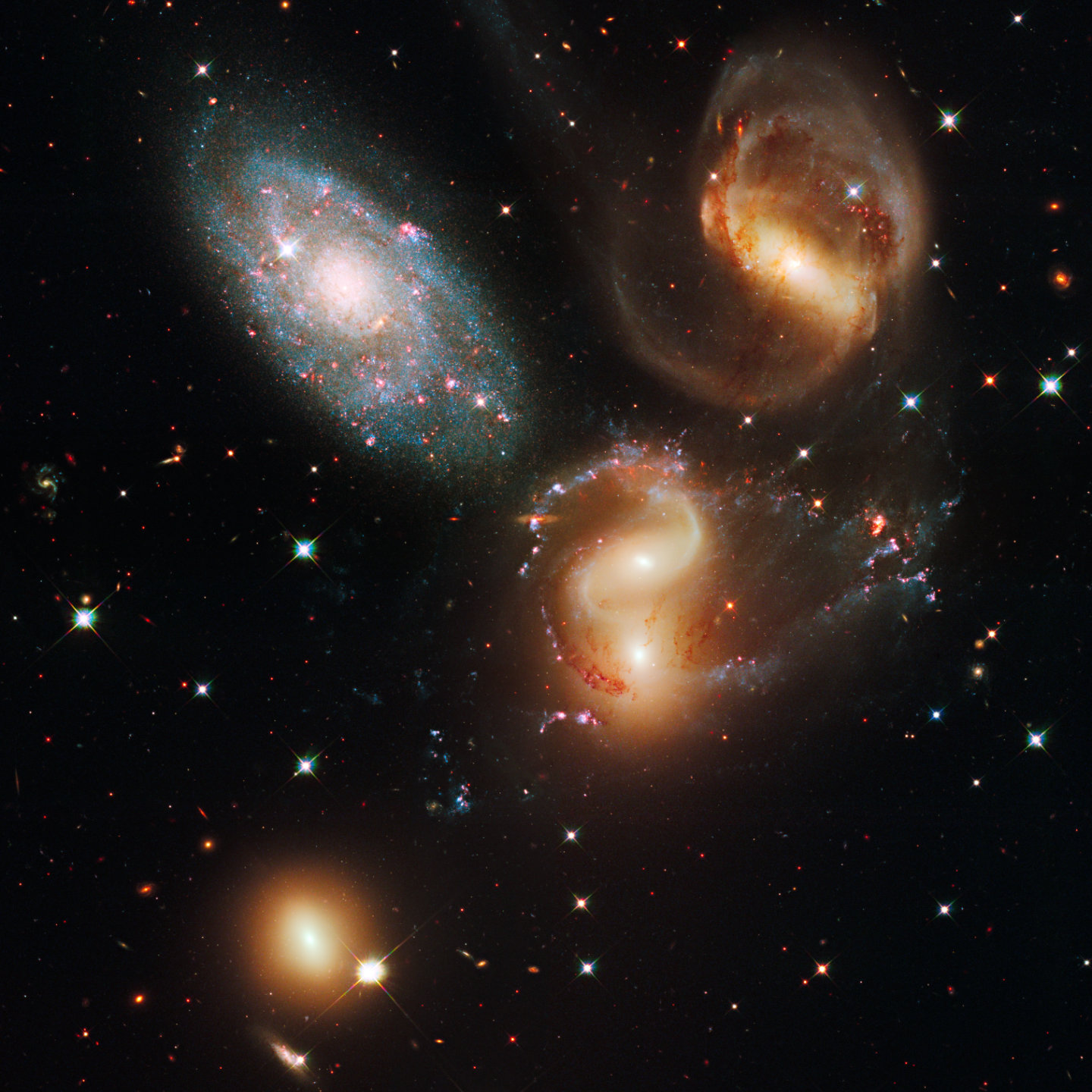 Stephan’s Quintet galaxy group by NASA, ESA, and the Hubble SM4 ERO Team - https://esahubble.org/images/heic0910i/